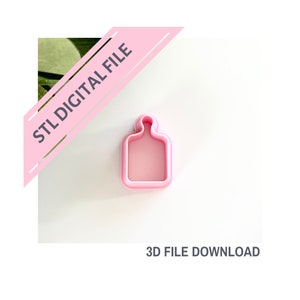 May include: A pink, rectangular cookie cutter with a handle-like top. The words "STL DIGITAL FILE" are printed on a pink diagonal banner. The words "3D FILE DOWNLOAD" are printed below the cookie cutter.