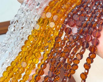 Conjunto de 10 contas de cristal facetadas, ideais para confecção de joias, artesanato e presentes feitos à mão.