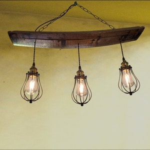 Whiskey barrel chandelier, ideal for mancave or cigar room, unique ceiling pendant from authentic bourbon barrels, adds warmth and character