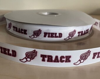 May include: White ribbon with a repeating pattern of burgundy running shoes with wings and the words "TRACK" and "FIELD".