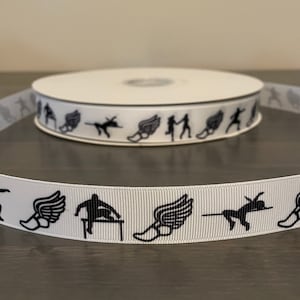 May include: White ribbon with black track and field silhouettes, including a runner, a hurdler, and a winged foot.