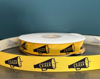 cheer ribbon in golden yellow and black, 7/8" grosgrain ribbon, 7/8" ribbon that is great for making leis, mums or cheer bows