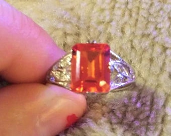 sterling silver and orange sapphire ring