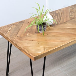 Coffee table in recycled wood herringbone pattern