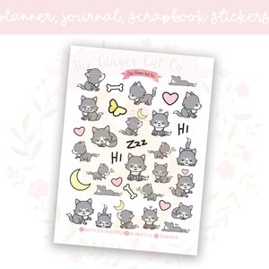 May include: A sheet of grey wolf stickers featuring various poses and expressions. The stickers include a sleeping wolf, a wolf with a bone, a wolf with a heart, a wolf with a moon, and a wolf saying "Hi". The stickers are ideal for planners, journals, and scrapbooks.
