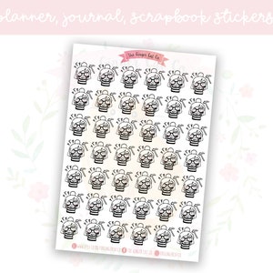 May include: A sheet of black and white planner, journal, and scrapbook stickers featuring a repeated design of a cartoon woman wearing glasses and a striped shirt with a hammer and wrench above her head. The text "The Ginger Girl Co." is at the top of the sheet.