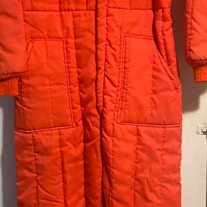 Vintage unisex retro mod 1970s orange one piece zip up snowsuit