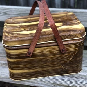 Vintage faux wood grain picnic basket with solid wood handles