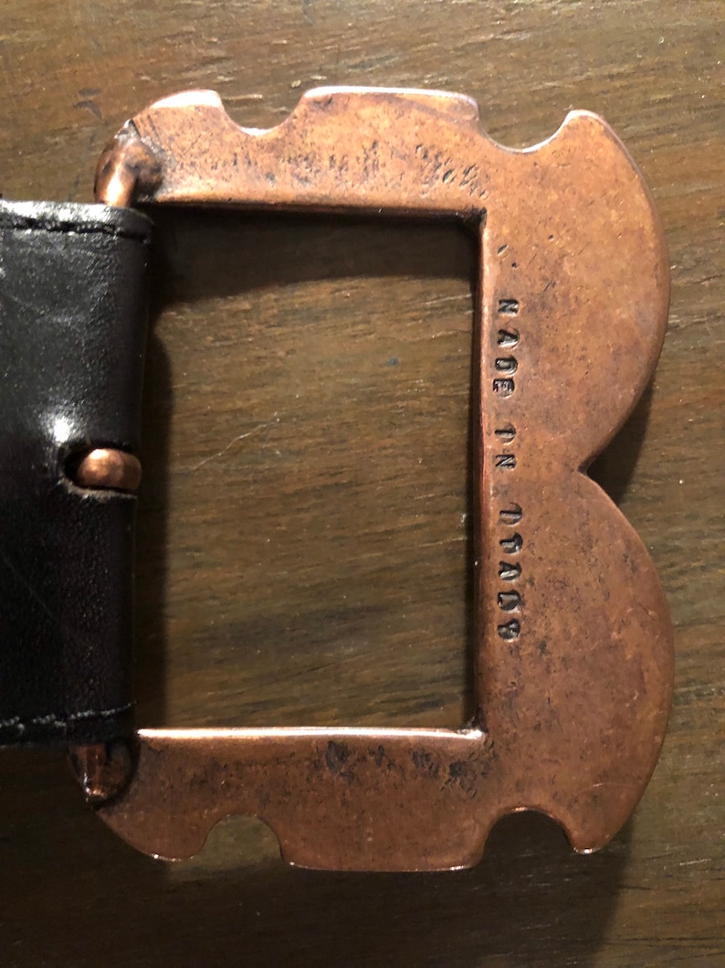 STREETS AHEAD vintage leather belt with copper buckle sideways hang womens acessories