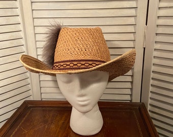 vintage mens large cowboy hat with feather/ country western wear