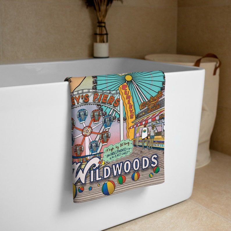 May include: A colourful illustration of a beach scene with a Ferris wheel, boardwalk, and the text "It's 80's long - the HOLLYWOOD of the EAST COAST - WILDWOODS".