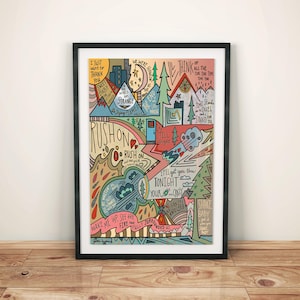 May include: A colourful illustrated print featuring a mountain landscape and lyrics from the song "Rush On" by the band "The 1975". The lyrics include "I just want to thank you", "We were hearts", "Think of all the time", "The world was strange", "Rush on", "I'll get you through tonight", "Wake me up, see the fire", "Shake baby, got you in my heart".