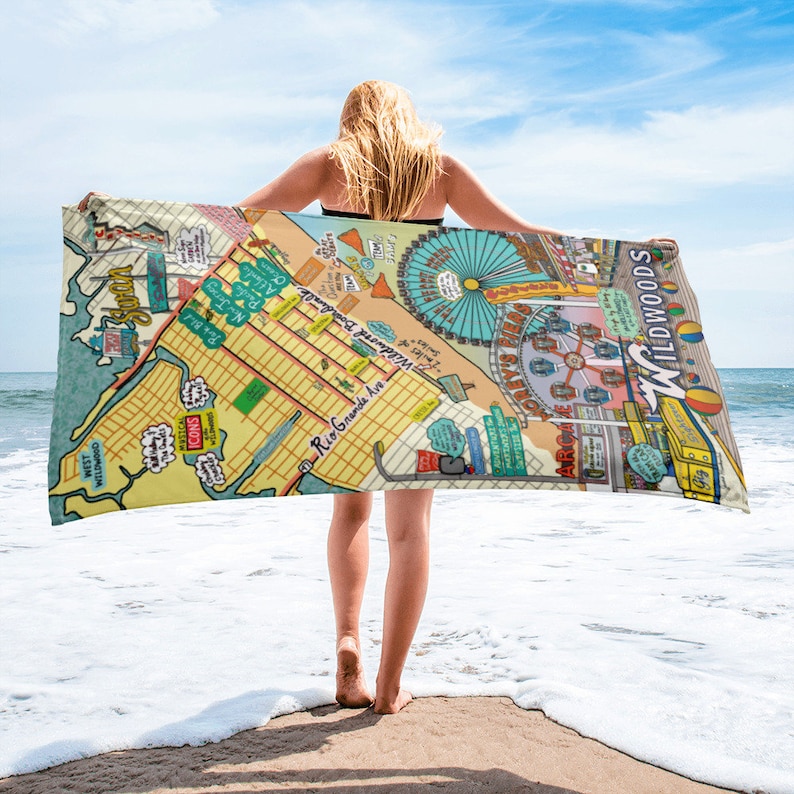 May include: A colourful beach towel featuring a map of Wildwood, New Jersey. The map includes landmarks such as the boardwalk, the Ferris wheel, and the beach. The towel is a great way to show your love for Wildwood.