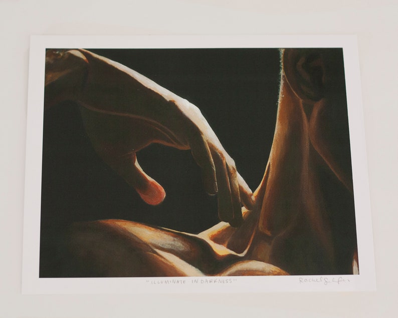 May include: A painting of two hands, one reaching out to touch the other. The hands are illuminated in a dark background, creating a dramatic effect. The painting is titled "Illuminate in Darkness".