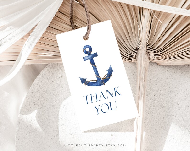 May include: A white thank you tag with a blue watercolour anchor and the text "Thank You".