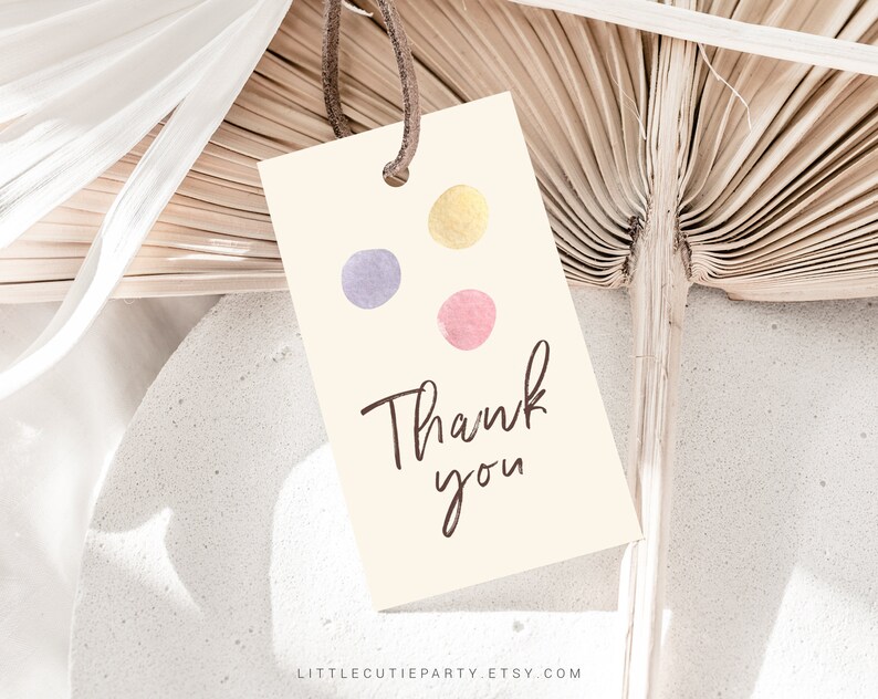 May include: A beige thank you tag with three watercolor dots in purple, pink, and yellow. The text "Thank you" is written in brown cursive.
