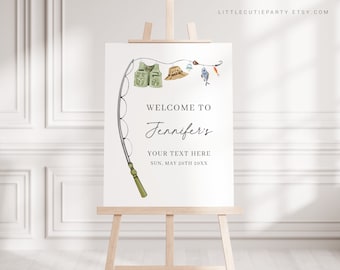 Op de afbeelding: Een wit welkomstbord op een ezel met een visthema. Het bord toont een hengel, vest, hoed, vis en de tekst "Welkom bij Jennifer". De datum wordt hieronder weergegeven.
