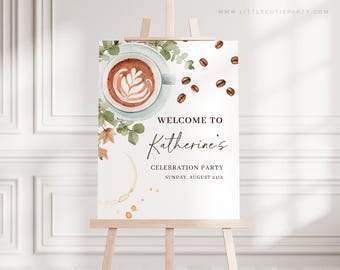 May include: A welcome sign on an easel features a watercolor illustration of a coffee cup with latte art, coffee beans, and greenery. The sign reads "Welcome to Katherine's Celebration Party, Sunday, August 24th."