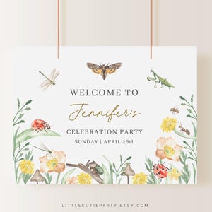 May include: A welcome sign for Jennifer's celebration party, featuring a watercolor illustration of a garden scene with ladybugs, butterflies, and flowers. The text reads "Welcome to Jennifer's Celebration Party Sunday | April 26th".