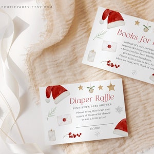 Peut inclure: Cartes de baby shower sur le th&egrave;me de No&euml;l avec des illustrations &agrave; l'aquarelle. Les cartes pr&eacute;sentent des bonnets de P&egrave;re No&euml;l, des &eacute;toiles, des flocons de neige et le texte "Books for Baby" et "Diaper Raffle". Les cartes sont sur fond cr&egrave;me.