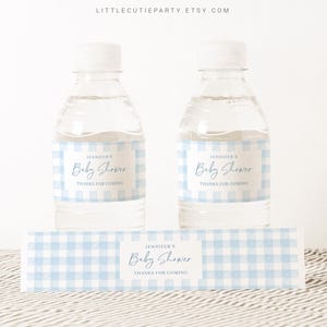 May include: Blue and white gingham patterned water bottle labels with the text "Jennifer's Baby Shower Thanks for Coming".