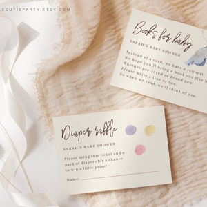 May include: Two cards for a baby shower. The top card is cream colored with brown text that reads "Books for baby" and "Sarah's Baby Shower". The text continues with instructions for guests to bring a book for the baby. The bottom card is cream colored with brown text that reads "Diaper Raffle" and "Sarah's Baby Shower". The text continues with instructions for guests to bring a pack of diapers for a chance to win a prize.