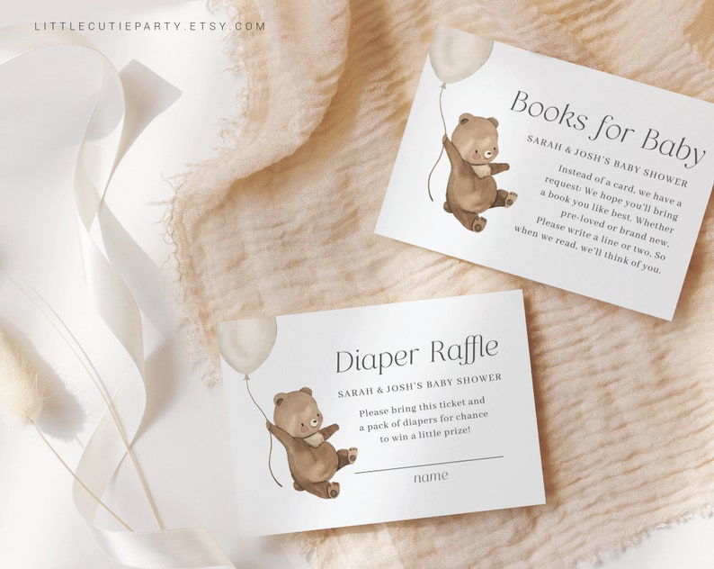 May include: Two printable cards for a baby shower. The top card features a brown bear holding a balloon and the text "Books for Baby". The bottom card features a brown bear holding a balloon and the text "Diaper Raffle".