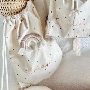 Turnbeutel Stoffbeutel Stoffrucksack Regenbogen fairtrade Rosé Weiß Flieder Beige Mädchen gepunktet personalisierbar Namen Kupfer Bio BW