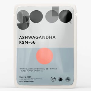 May include: A white and clear plastic pouch with the word "godo" in a stylized font. The pouch contains "ASHWAGANDHA KSM-66" and a pink circle. The text "ORGANIC ASHWAGANDHA KSM-66 + GINGER + BLACK PEPPER CAPSULES" is also visible. The pouch is labeled "PLASTIC FREE" and "FOOD SUPPLEMENT".