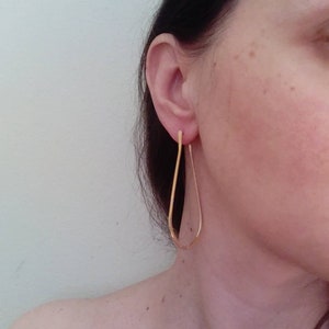 oval hoops in silver, oval shape hoop earrings, minimal design, geometric shape, hammered earrings, gold plated silver hoops, boho jewelry image 5