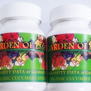 May include: Three white plastic bottles with green labels that say "GARDEN OF ESSENTIALS" and "ORGANIC CUCUMBER SEED".