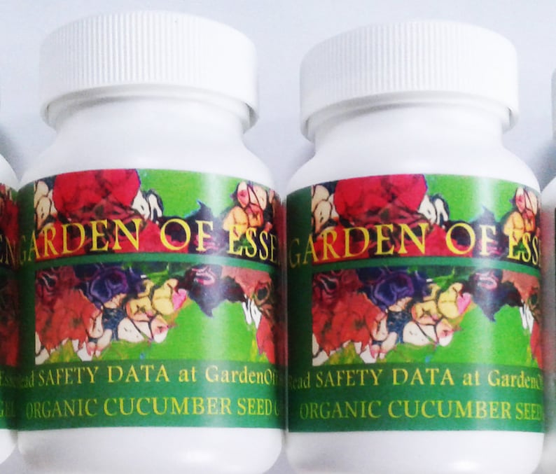 May include: Three white plastic bottles with green labels that say "GARDEN OF ESSENTIALS" and "ORGANIC CUCUMBER SEED".