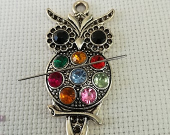 Coloured stone owl needleminder