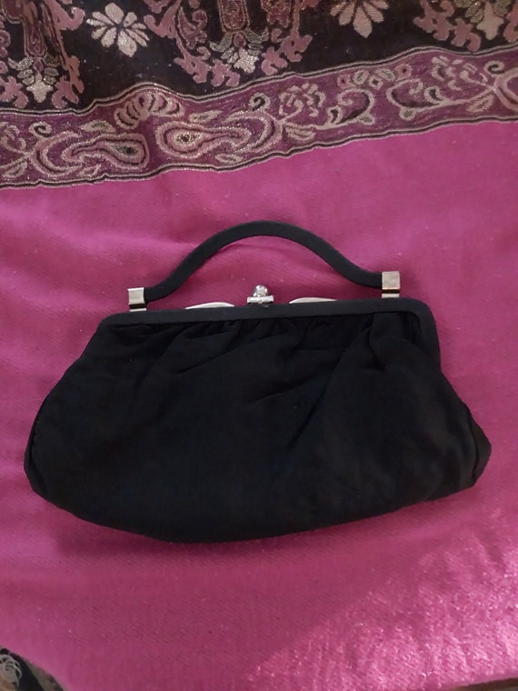Black Hand Held Bag Gem Black Hand Held Bag Gem