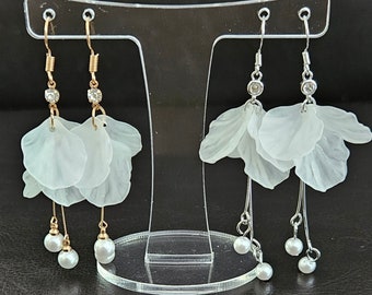 Beautiful drop Earrings flower pearl detail in gold or silver. comes boxed