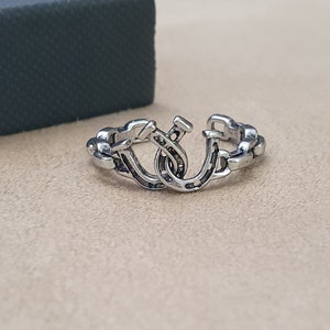 Double Horseshoe ring silver. Adjustable. comes boxed