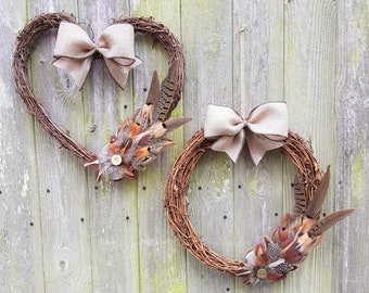 Beautiful large wicker wreath with pheasant, partridge and guiuneafowl feathers