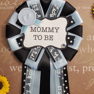 It's a boy shower corsage, mommy to be, corsage pin, party theme blue and black image 2