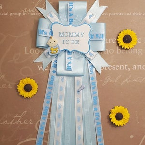 It's a boy shower corsage, mommy to be, corsage pin, party theme baby blue
