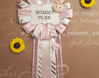 It's a girl shower corsage, mommy to be, corsage pin, party theme pink