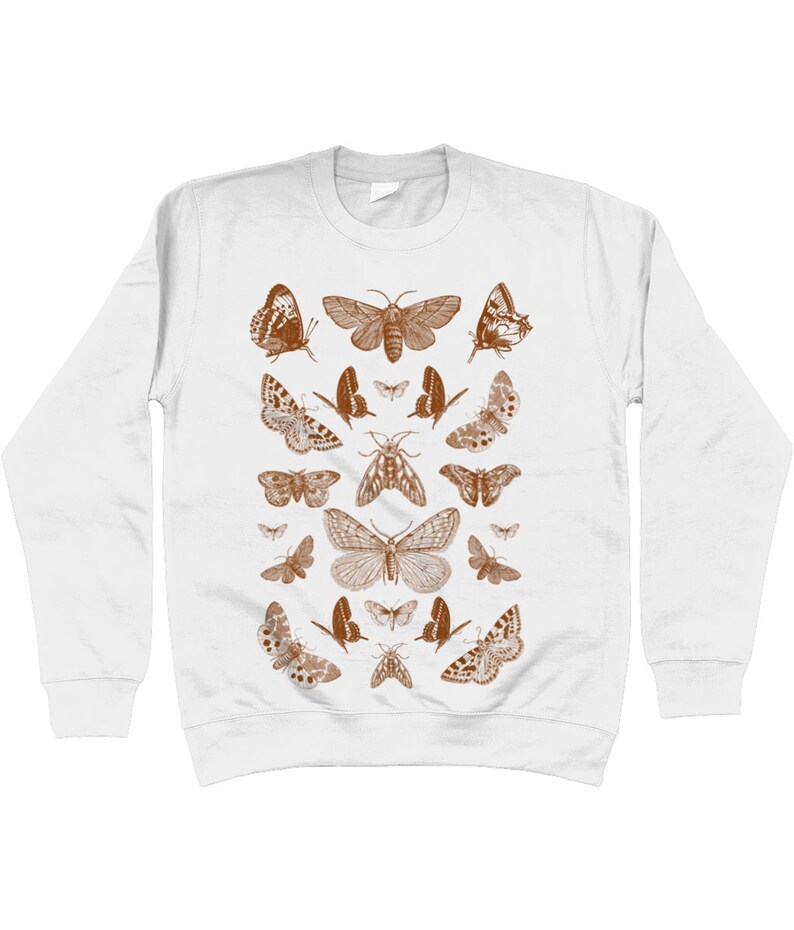 May include: White sweatshirt with a brown print of various butterflies and moths.