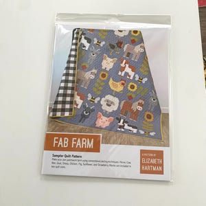 May include: A quilt pattern featuring a patchwork design of farm animals, including a horse, cow, bee, goat, sheep, chicken, pig, sunflower, and strawberry. The pattern is titled "FAB FARM" and is by Elizabeth Hartman.