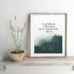 May include: A framed print with a quote about sharing time with someone you love. The quote is "I would rather share one lifetime with you than have all the stars of this world alone." - Jack Tudor. The print features a misty forest scene in shades of green.