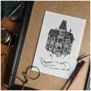 May include: Black and white illustration of a haunted house with a hand reaching up to catch it. The house is falling apart and has many windows. The hand is detailed and has long fingers.