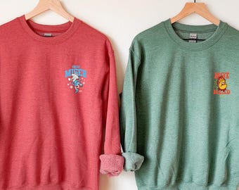 Camiseta Miser de Calor y Nieve: Sudadera "El Año Sin Papá Noel", Camiseta de los Hermanos Miser