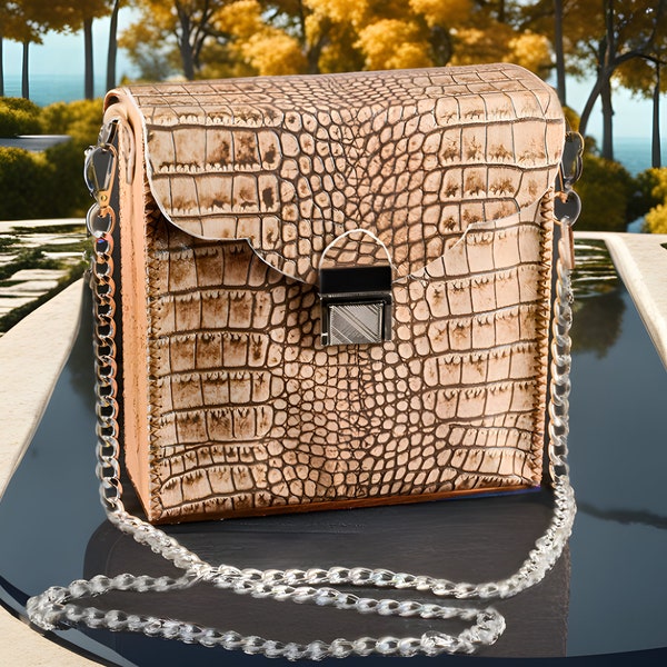 Chic women's leather bag. Bag made of genuine leather with a crocodile pattern.