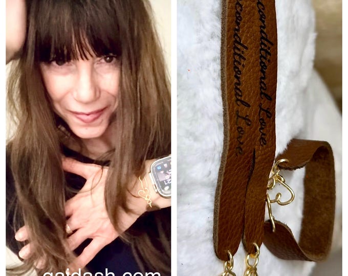 Leather bracelet with wire wrapped heart and engraved message “Unconditional Love"