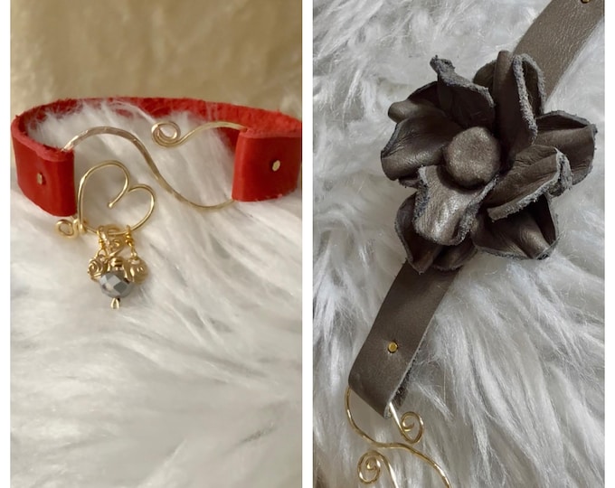 Red leather bracelet with gold plated wire and beads.