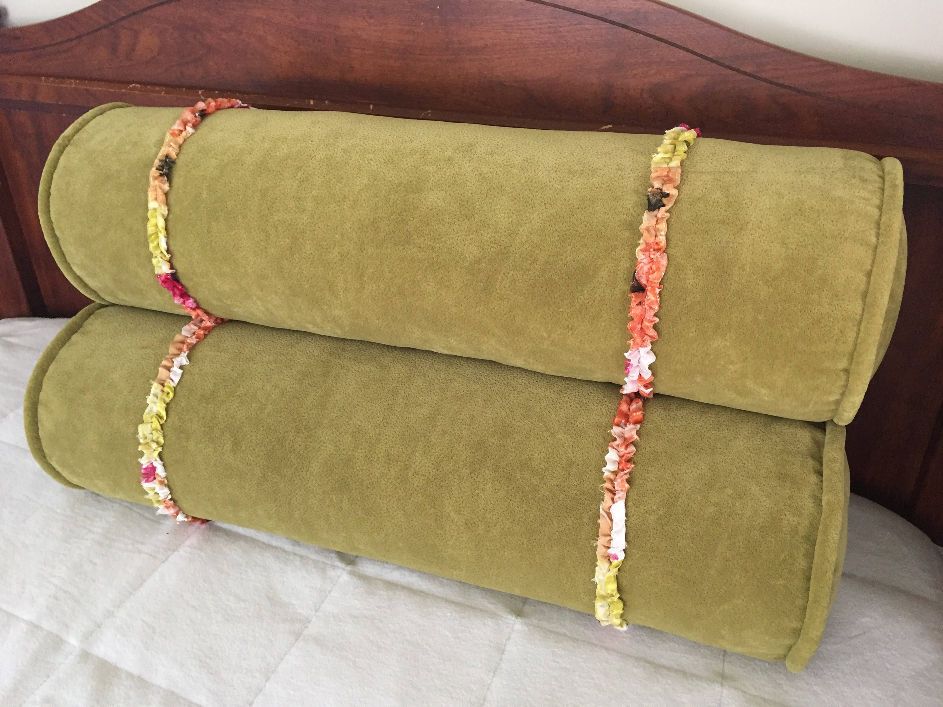 Olive drab velvet bolster pillow with multicolored ruffles ...