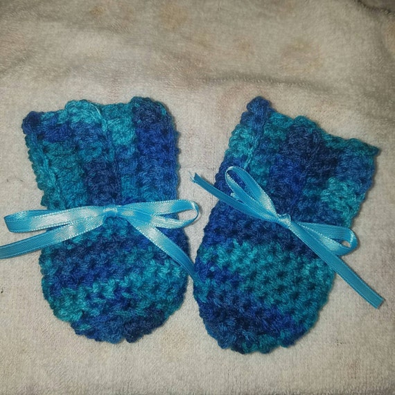 light blue mittens